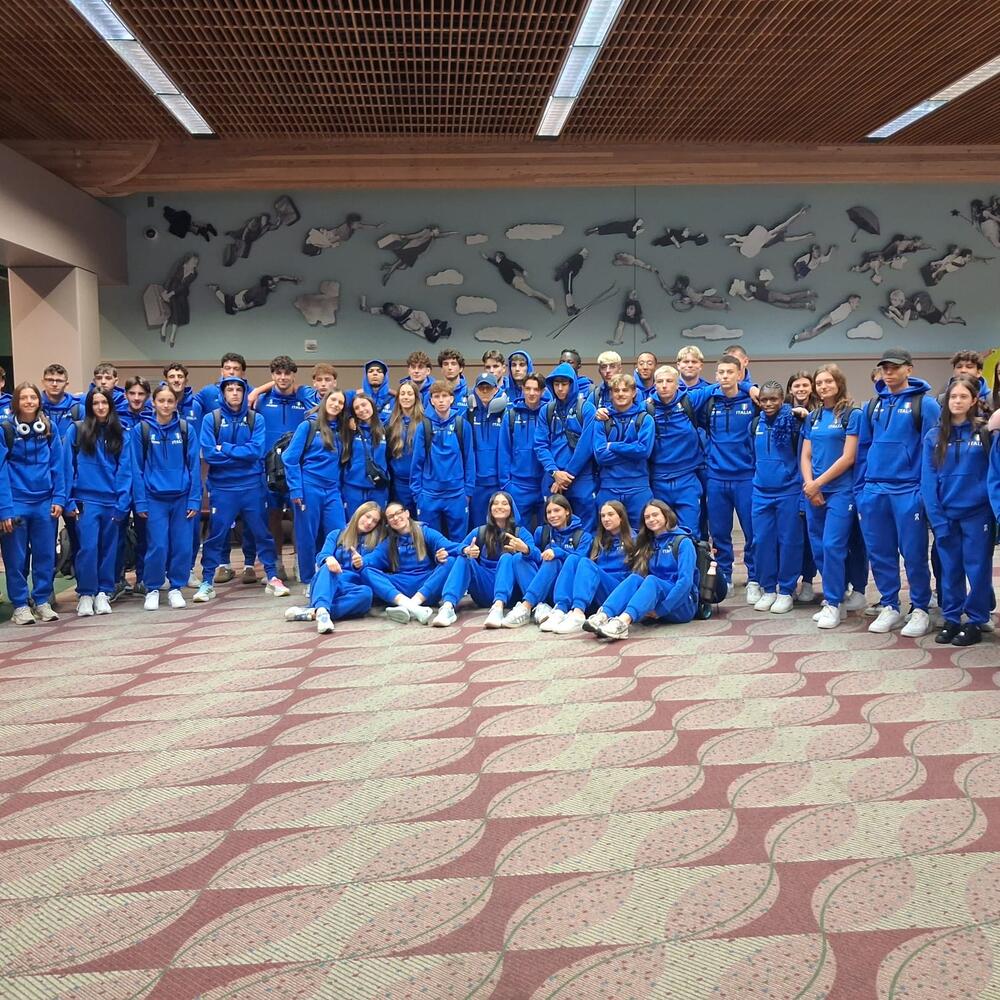 Squadra azzurra in campo a Eugene, atleti in azione, gare di atletica
